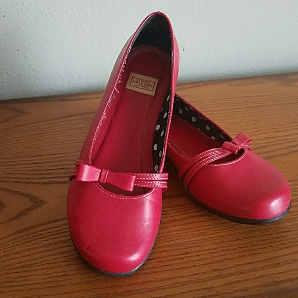 Red Arizona Loafers with cute bows.